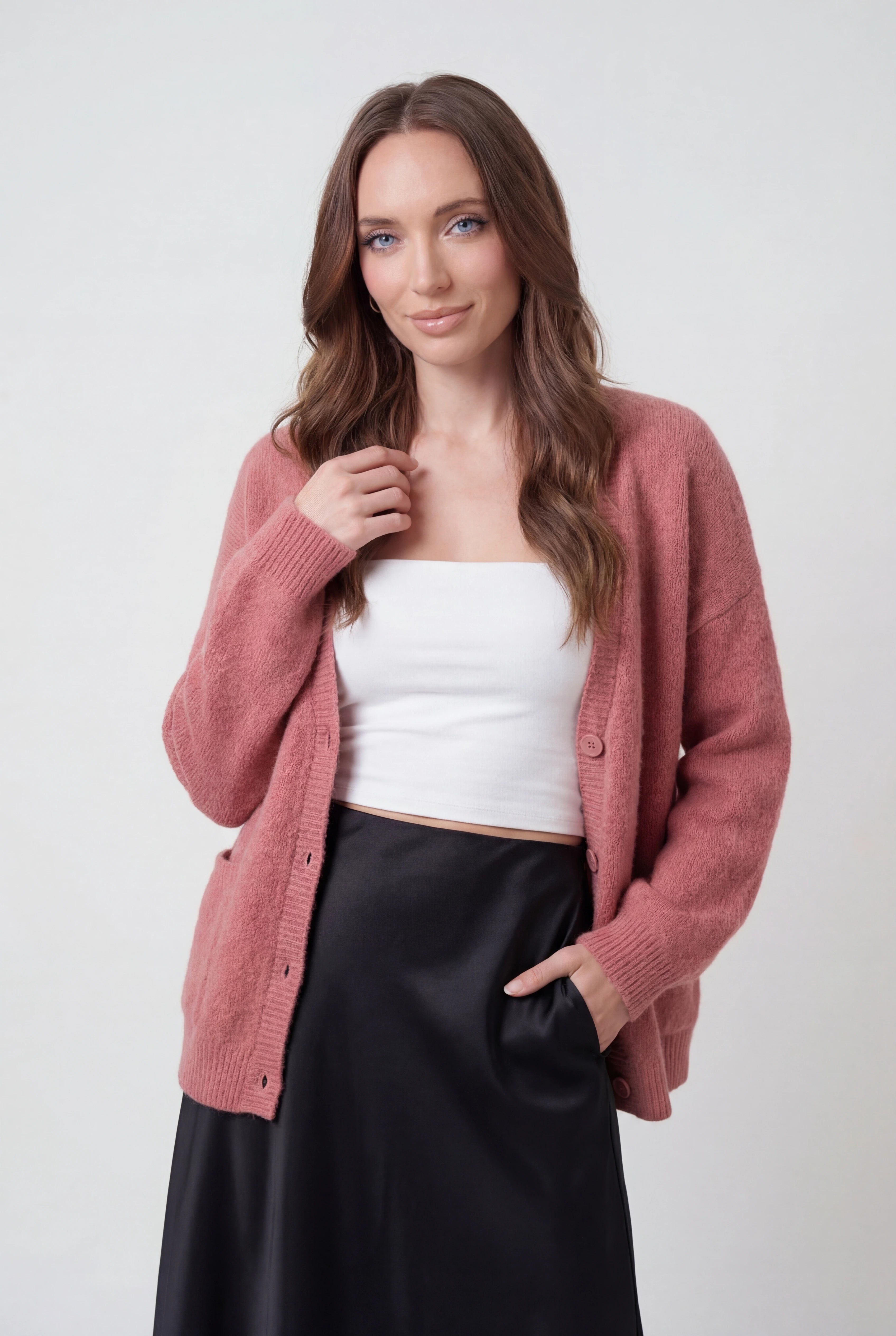 Pink knit cardigan sweater by Lumina Wear with a cozy, relaxed fit, featuring soft knit fabric and stylish design.