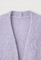 Cozy purple knit cardigan with ribbed details from Lumina Wear, featuring a relaxed fit and textured fabric for comfort and style.