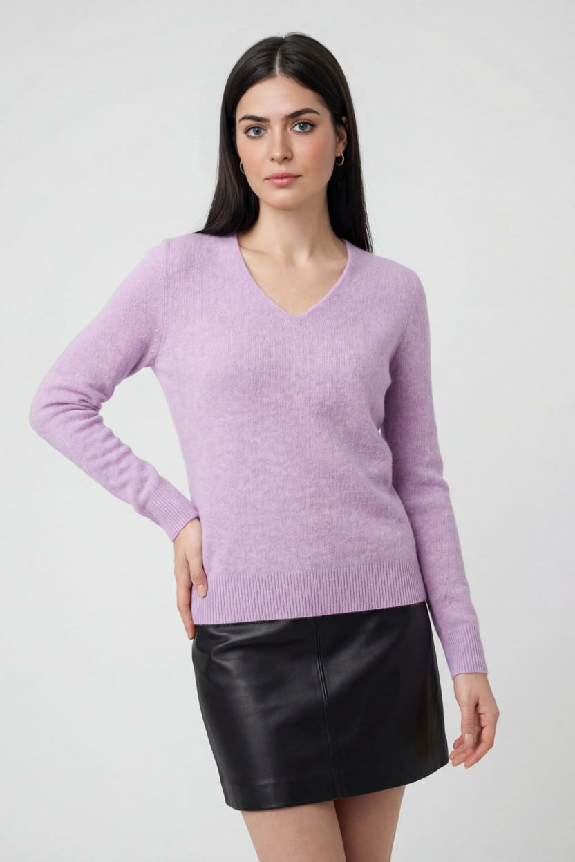 Lumina Wear Isabella purple knit sweater with V-neckline, showcasing a cozy and stylish design in a soft, vibrant purple color.
