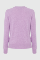 Isabella Lumina Wear cozy purple knit sweater with V-neckline, long sleeves, and ribbed cuffs, casual winter fashion for women.