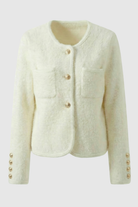 White women's cardigan sweater with ribbed hem, named Isabella by Lumina Wear, featuring a cozy, soft knit fabric.