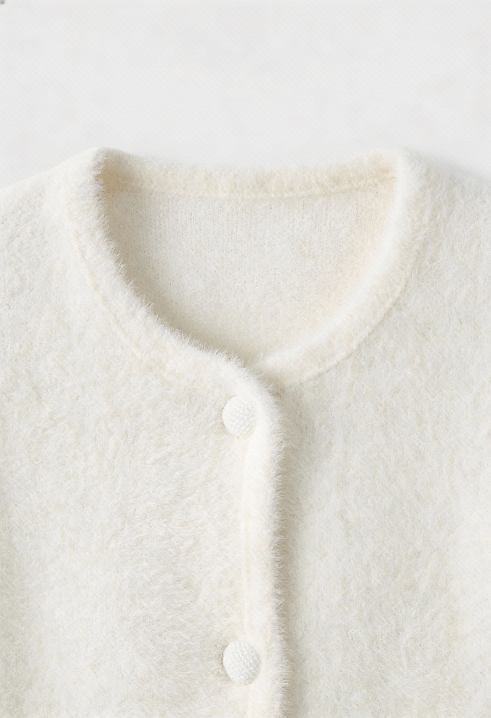 Lumina Wear Isabella cozy white open-front cardigan sweater with relaxed fit, displayed on a model.