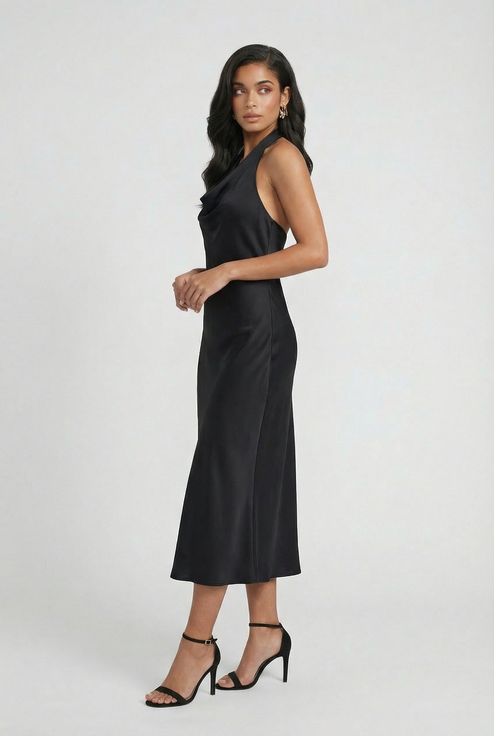 Black Isabella backless midi dress by Lumina Wear, featuring a sleek summer chic design, suitable for women's elegant occasions.