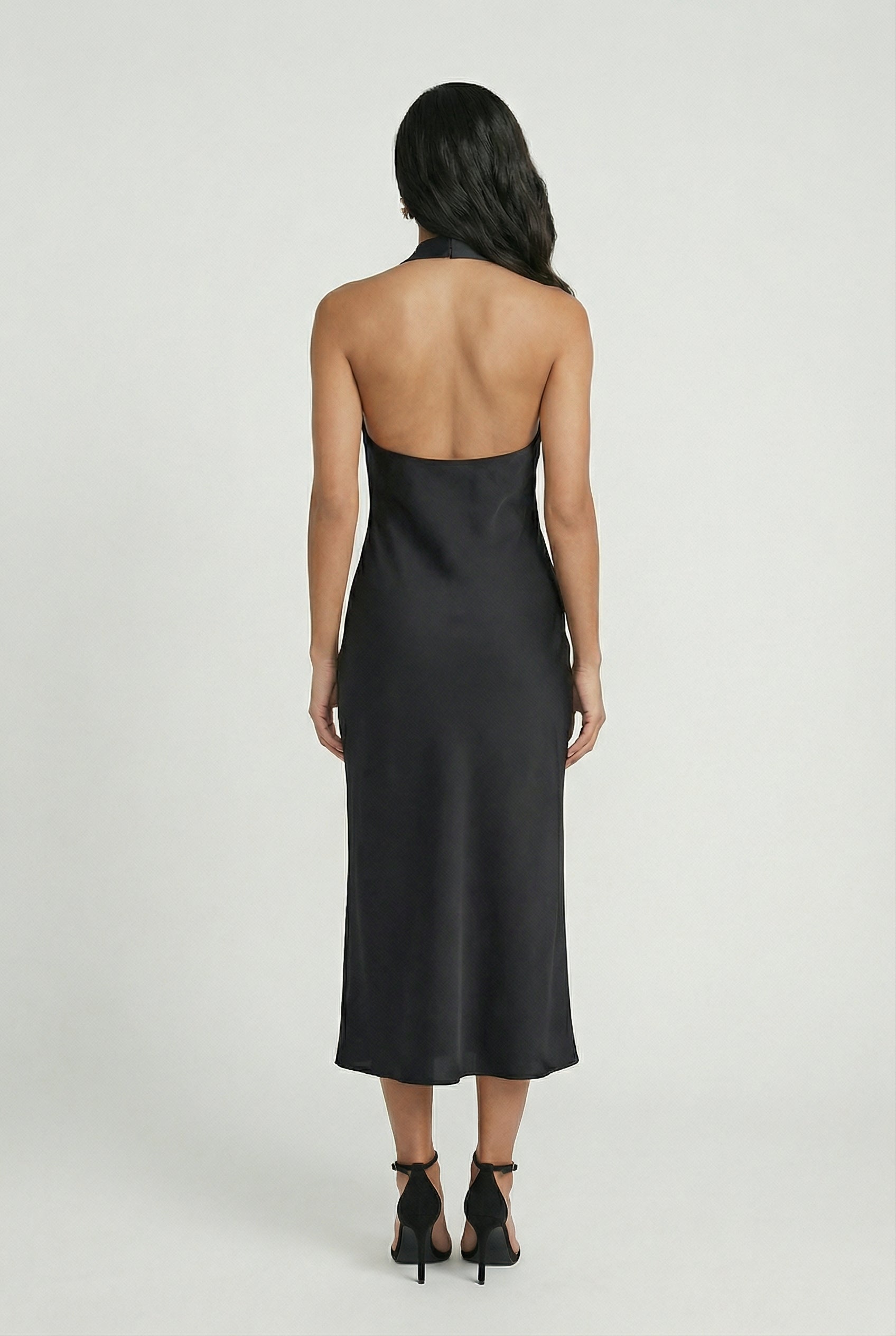 Black Isabella backless midi dress by Lumina Wear, stylish summer women's dress with elegant, flowing design.