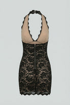 Black backless mini dress by Lumina Wear, featuring a versatile cut and elegant design, perfect for stylish women's dresses.