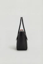 Elegant black crocodile handbag with adjustable strap by Lumina Wear, featuring a sophisticated design and textured finish.