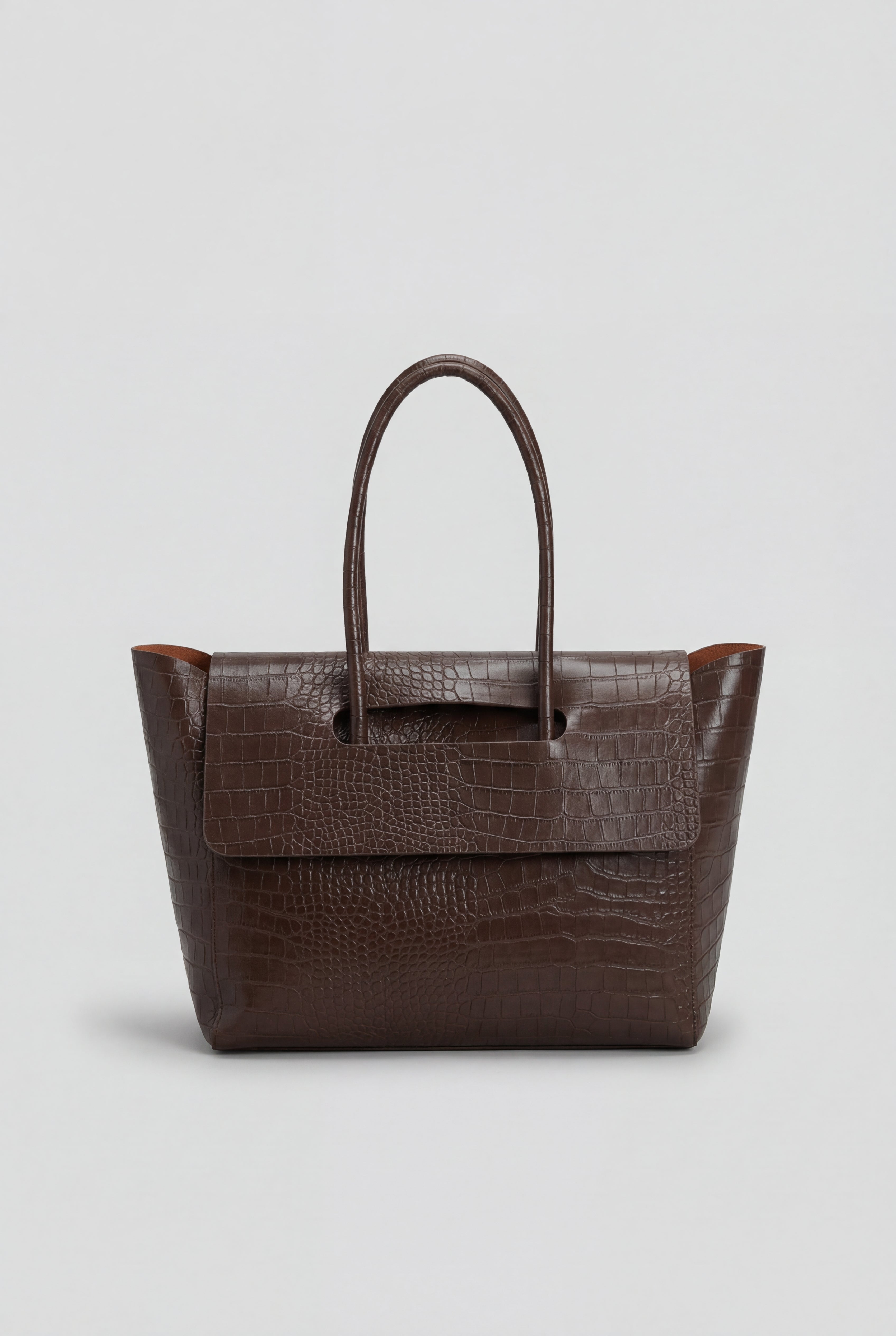 Elegant black crocodile leather handbag with adjustable strap from Lumina Wear, featuring a sleek, sophisticated design.