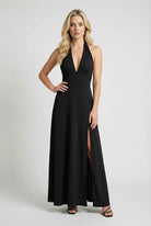 Elegant black halter neck dress by Lumina Wear, featuring a versatile fit and stylish design for special occasions.