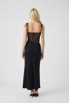 Elegant black lace dress named Isabella by Lumina Wear, featuring a flowy design and casual style.