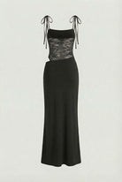 Elegant black lace dress with a flowy design from Lumina Wear, perfect for casual occasions, featuring intricate lace details.