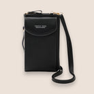 Elegant black leather clutch bag from Lumina Wear with a versatile strap, perfect for stylish evening or daytime use.