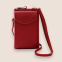 Elegant black leather clutch bag by Lumina Wear with versatile strap, showcasing its sleek design and compact style.