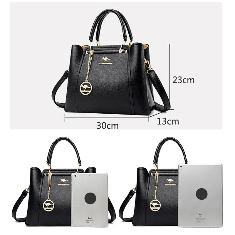 Elegant black leather handbag by Lumina Wear featuring gold accents, with structured design and top handle for versatile style.