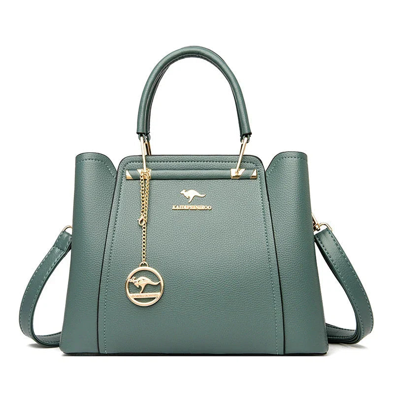 Elegant black leather handbag with gold accents from Lumina Wear's Isabella collection, featuring a sleek and sophisticated design.