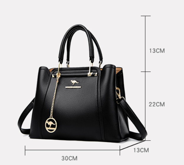 Elegant black leather handbag with gold accents from Lumina Wear's Isabella collection, featuring a sleek design and stylish details.