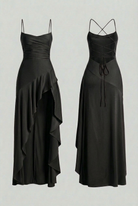 Elegant black maxi dress with lace-up back by Lumina Wear, featuring flowing fabric and stylish silhouette.