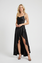 Elegant black maxi dress with lace-up back from Lumina Wear, featuring flowing fabric and stylish design.