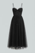 Elegant black sleeveless midi dress from Lumina Wear, featuring a sophisticated and stylish design, perfect for formal occasions.