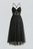 Elegant black sleeveless midi dress by Lumina Wear, featuring a sophisticated fit and stylish design.