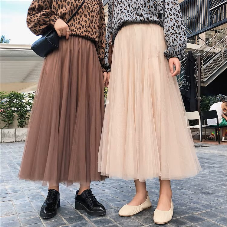 Elegant black tulle skirt for women by Lumina Wear, featuring a flattering fit and stylish design.