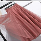 Elegant black tulle skirt from Lumina Wear featuring a flattering fit, perfect for women's stylish wardrobe essentials.