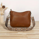 Elegant black vegan leather shoulder bag by Lumina Wear featuring an adjustable strap and stylish design.