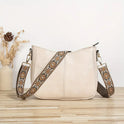 Elegant black vegan leather shoulder handbag by Lumina Wear featuring an adjustable strap and stylish design.