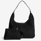 Elegant black vegan suede tote bag from Lumina Wear featuring sleek design and spacious interior for everyday use.