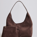 Elegant black vegan suede tote bag from Lumina Wear with sleek design, spacious interior, and sturdy handles.