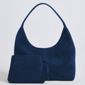 Elegant black vegan suede tote bag by Lumina Wear, featuring a spacious handbag design with sleek handles and modern style.