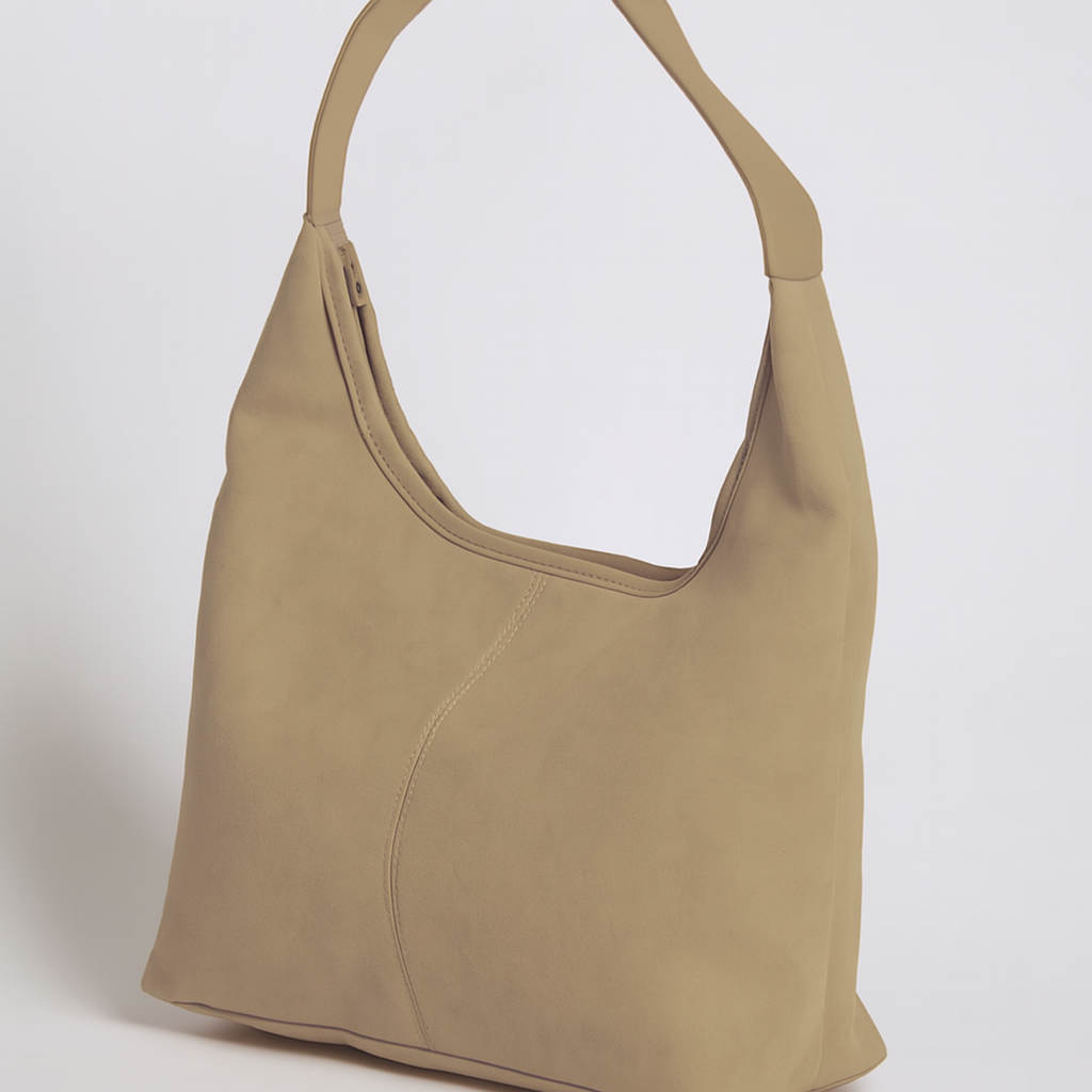Elegant black vegan suede tote bag from Lumina Wear, featuring a spacious design and sturdy handles for stylish everyday use.