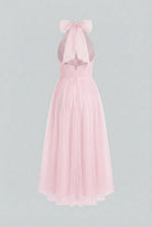 Elegant blush midi dress by Lumina Wear featuring a flattering silhouette, perfect for special occasions.