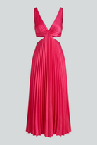 Elegant blush pink pleated dress with flowing silhouette from Lumina Wear, showcasing a stylish and graceful design.