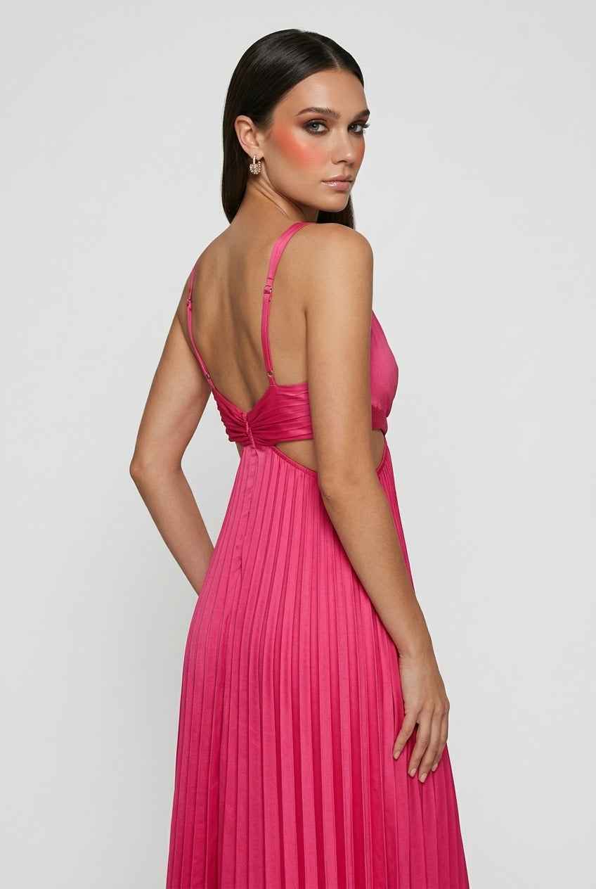 Elegant blush pink pleated dress with flowing silhouette by Lumina Wear, featuring soft fabric and stylish design.