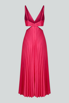 Elegant blush pink pleated dress from Lumina Wear featuring a flowing silhouette and stylish design.