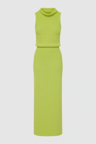 Elegant green knit skirt and top set by Lumina Wear, featuring a flattering fit and stylish two-piece dress design.