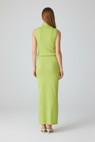 Elegant green knit skirt and top set by Lumina Wear, featuring a flattering fit, perfect for stylish two-piece dress ensembles.