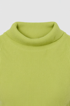 Elegant green knit skirt and top set by Lumina Wear, featuring a flattering fit, perfect for stylish two-piece dress outfits.