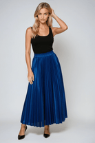 Gold high waist pleated maxi skirt from Lumina Wear, flowing and elegant with a stylish design.