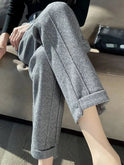 Gray high-waisted pencil trousers from Lumina Wear, elegant and tailored for a sophisticated look.