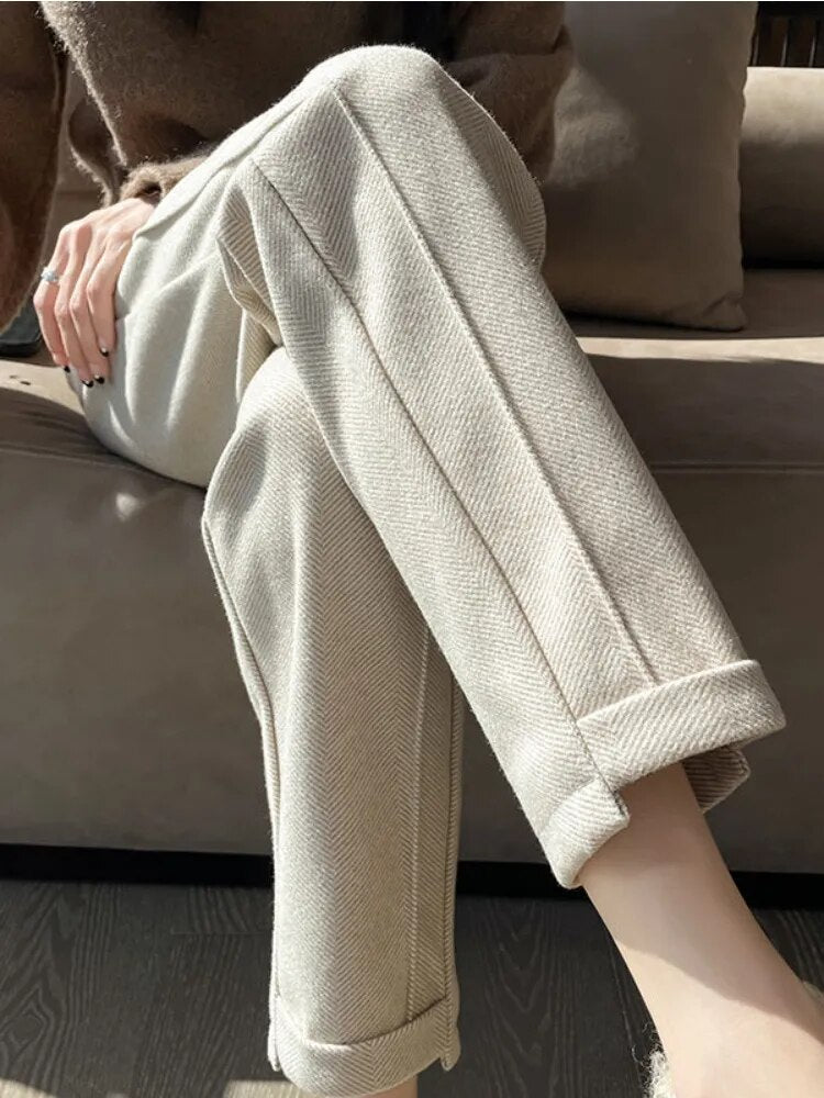 Gray high-waisted pencil trousers by Lumina Wear, part of the Isabella collection, styled for a sleek, elegant look.