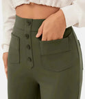 Green high-waisted trousers by Lumina Wear, elegant fit with a flattering silhouette, perfect for stylish women.