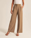 Blue Isabella high-waisted wide-leg trousers from Lumina Wear, stylish and elegant pants for women, shown on a model.