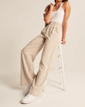 Blue Isabella high-waisted wide-leg trousers by Lumina Wear, stylish women's pants with a flowing fit and elegant design.