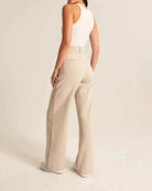 Blue Isabella high-waisted wide-leg trousers by Lumina Wear, stylish women's trousers with a tailored fit and elegant design.