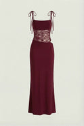 Elegant burgundy lace bodycon dress with spaghetti straps from Lumina Wear, featuring a fitted silhouette and delicate lace details.
