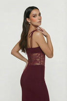 Lumina Wear Isabella burgundy lace bodycon dress with spaghetti straps, fitted silhouette for women's elegant evening wear.