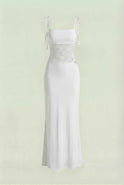 White Isabella dress by Lumina Wear with elegant lace detail and a flattering silhouette, perfect for stylish occasions.