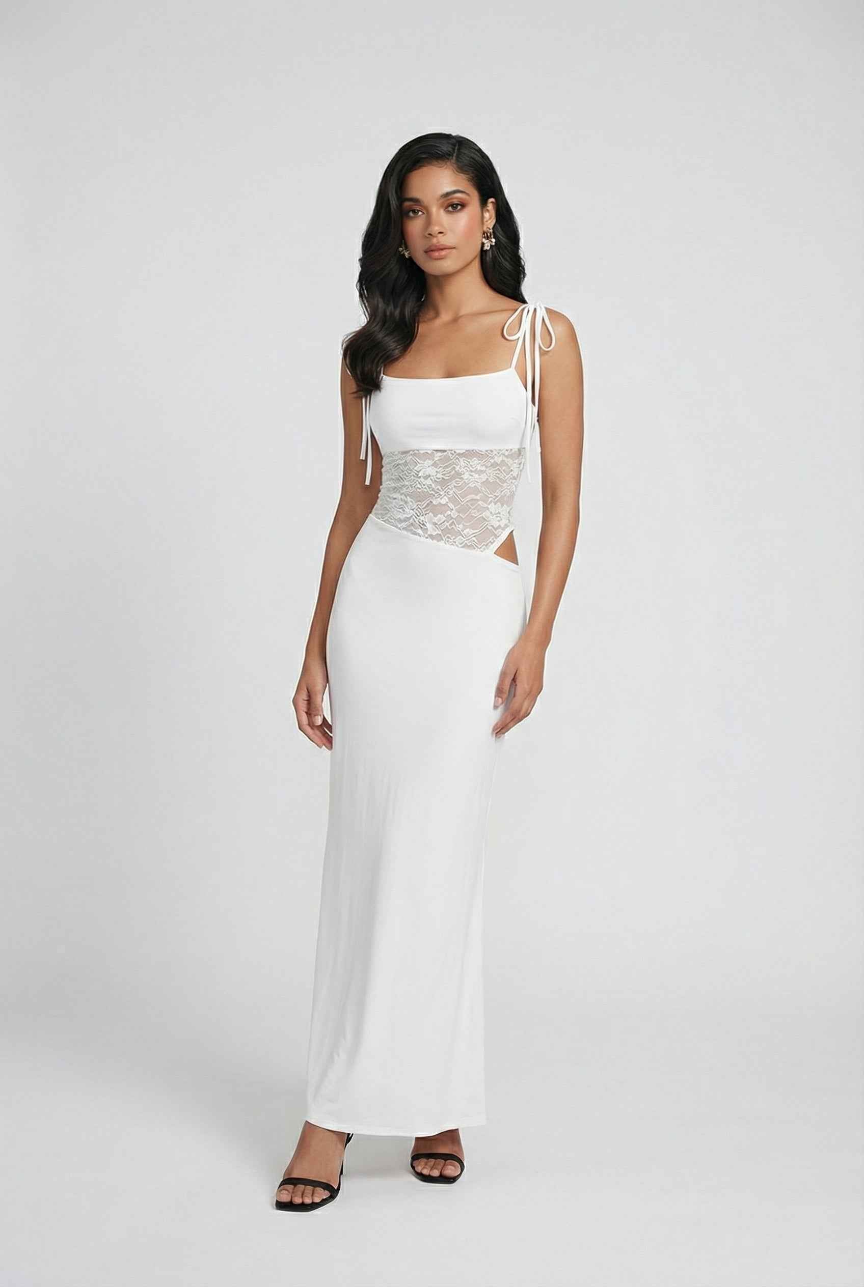 White women's lace dress by Lumina Wear, featuring an elegant design and flattering silhouette for sophisticated style.