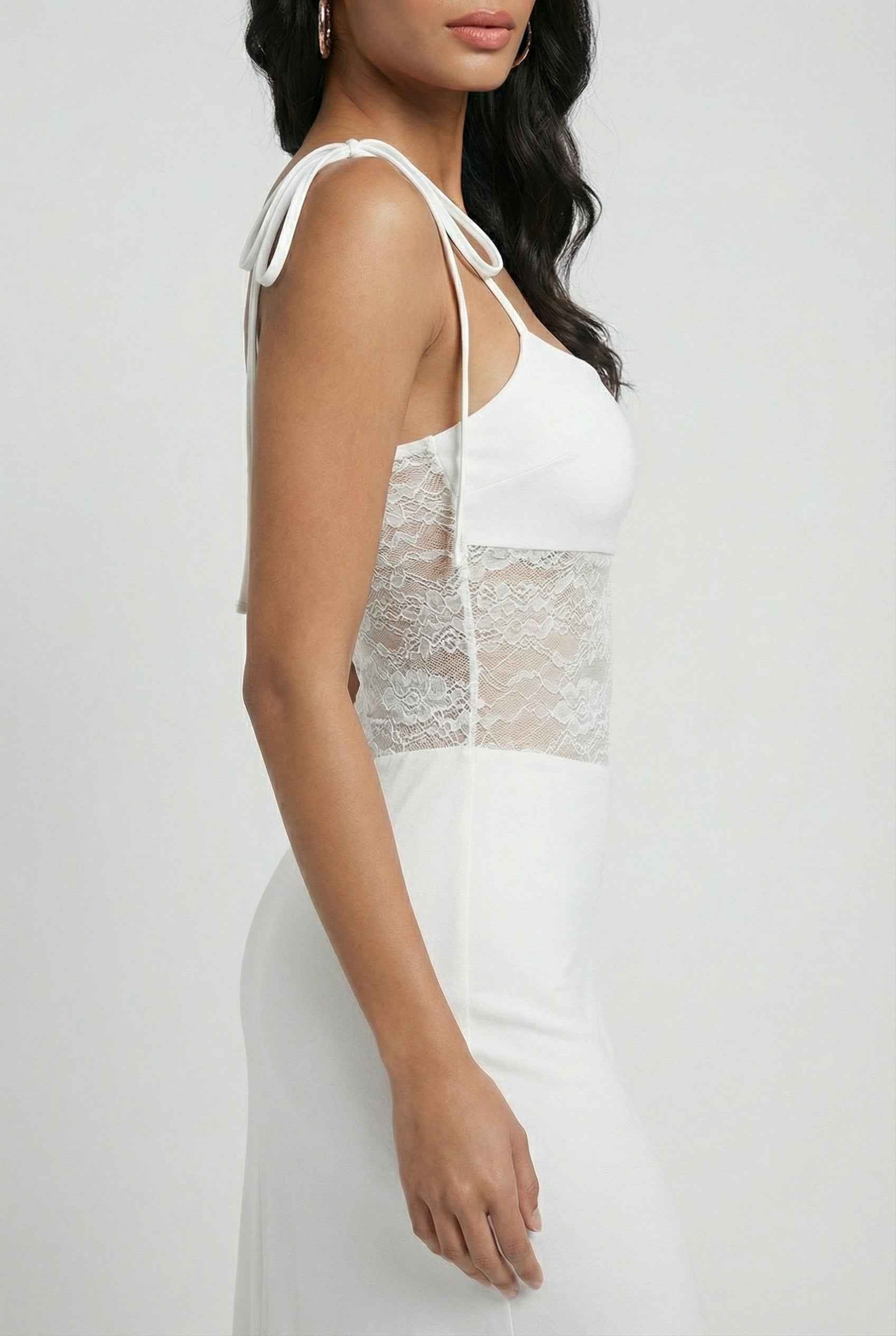 White women's dress by Lumina Wear featuring elegant lace details and a flattering silhouette, perfect for formal occasions.